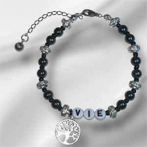 Bracelet perles plates Heishi noir et argenté « arbre de vie »
