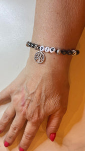 Bracelet perles plates Heishi noir et argenté « arbre de vie »