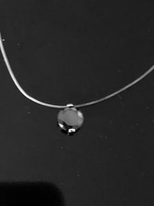 Brillant zirconium sur fil transparent