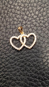 Pendentif plaqué or jaune « 2 coeurs enlacés »