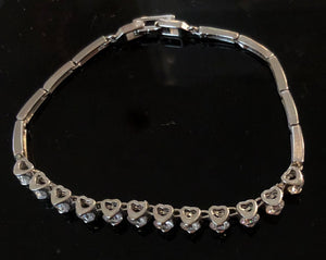 Bracelet souple plaqué or blanc et zirconiums