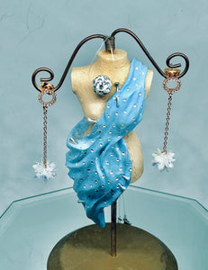 Boucles d’oreilles fleurs blanches