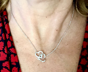 Pendentif plaqué or blanc « Coeurs enlacés « 