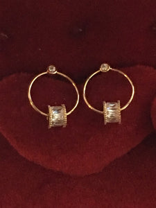 Boucles d'oreilles "tournantes" plaqué or blanc ou jaune