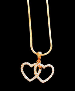 Pendentif plaqué or jaune « 2 coeurs enlacés »