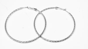 Créoles stylisées en plaqué or blanc