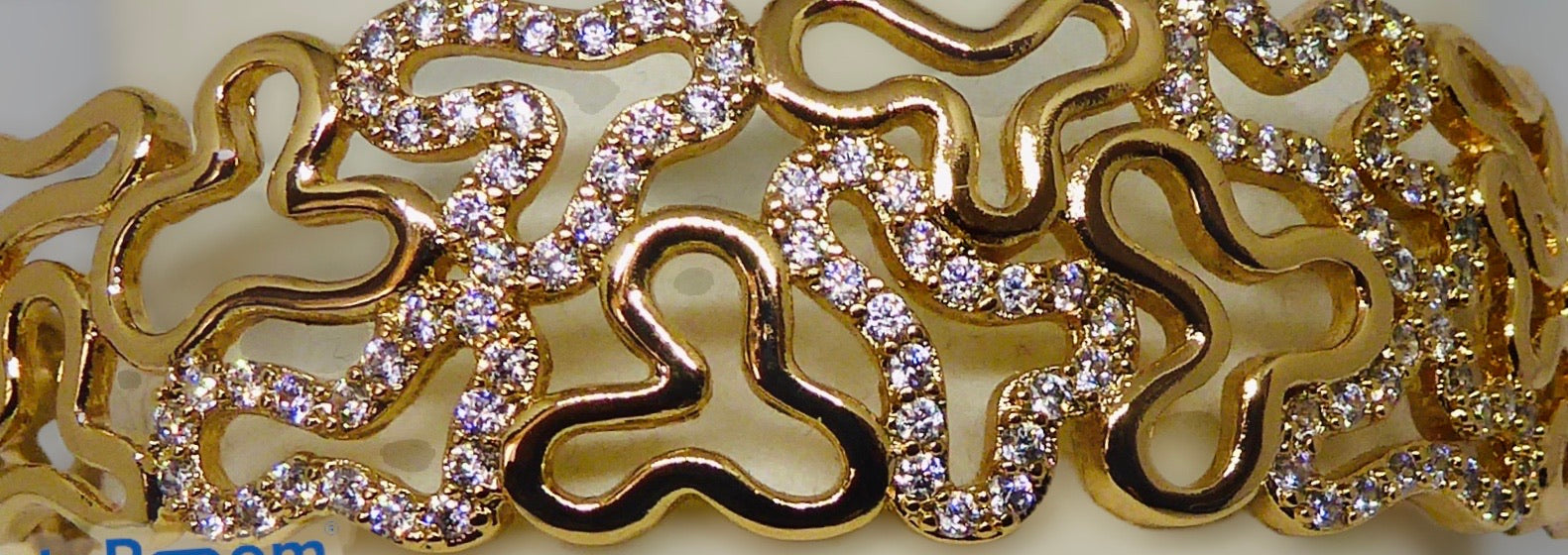 Bracelet rigide plaqué or et zirconiums