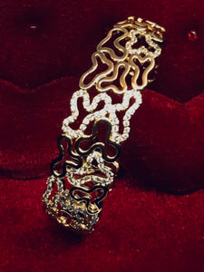 Bracelet rigide plaqué or et zirconiums
