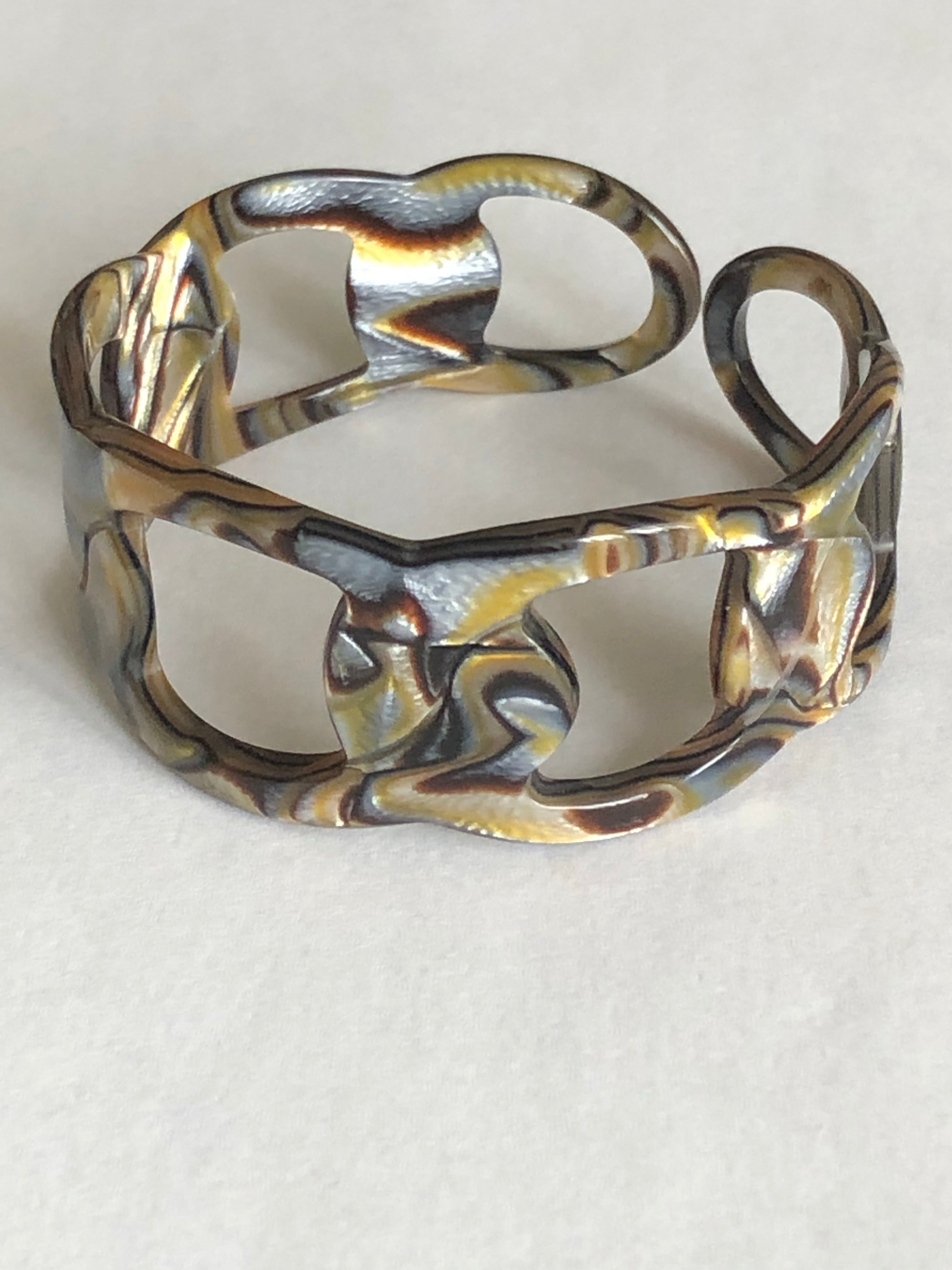 Bracelet-manchette ajouré, motif onyx