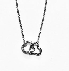 Pendentif plaqué or blanc « Coeurs enlacés « 